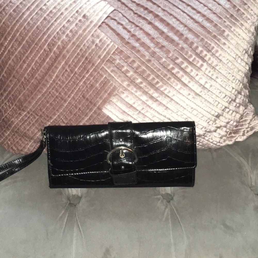 Black snakeskin clutch